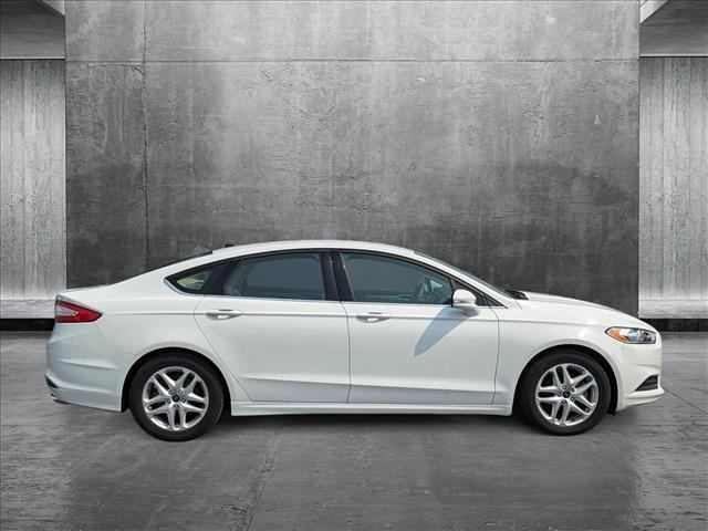 used 2016 Ford Fusion car, priced at $16,379
