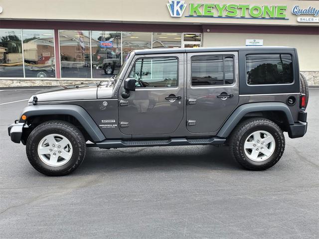 used 2016 Jeep Wrangler Unlimited car, priced at $21,978