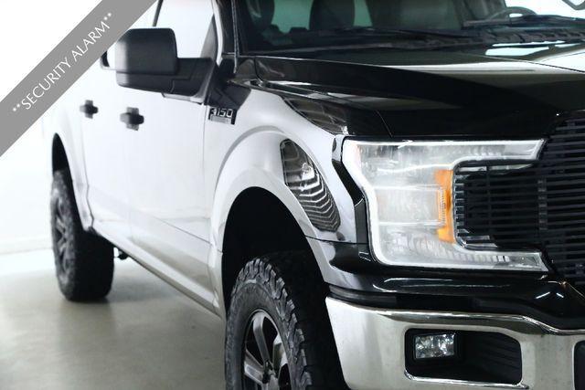 used 2018 Ford F-150 car, priced at $20,000