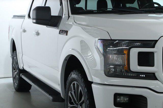 used 2018 Ford F-150 car, priced at $25,000