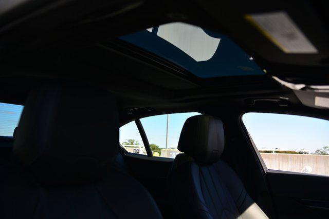 used 2024 BMW i5 car, priced at $46,496