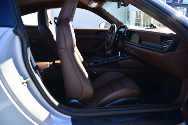 used 2024 Porsche 911 car, priced at $210,996