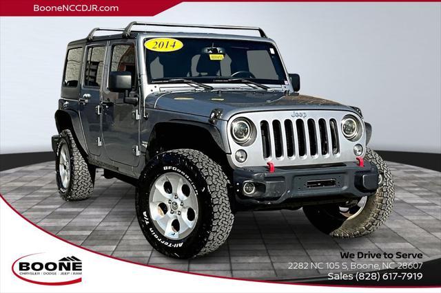 used 2014 Jeep Wrangler Unlimited car, priced at $18,575