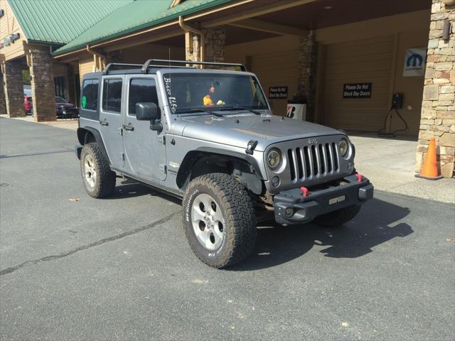 used 2014 Jeep Wrangler Unlimited car, priced at $19,812