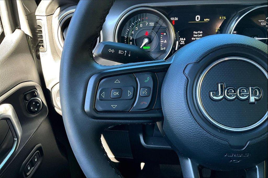 used 2023 Jeep Wrangler 4xe car, priced at $32,123
