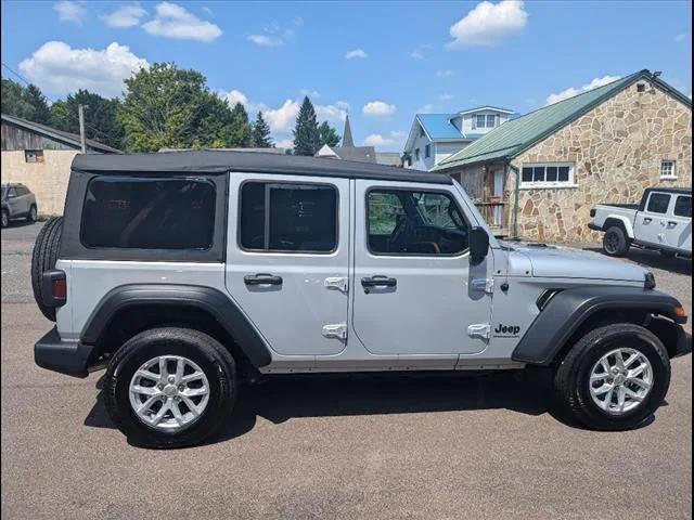 used 2023 Jeep Wrangler car, priced at $39,407