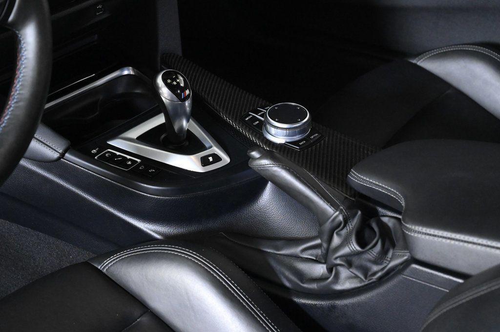 used 2018 BMW M4 car, priced at $44,900