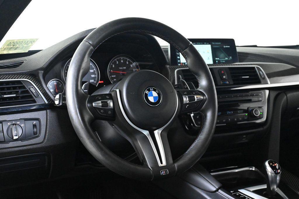 used 2018 BMW M4 car, priced at $44,900