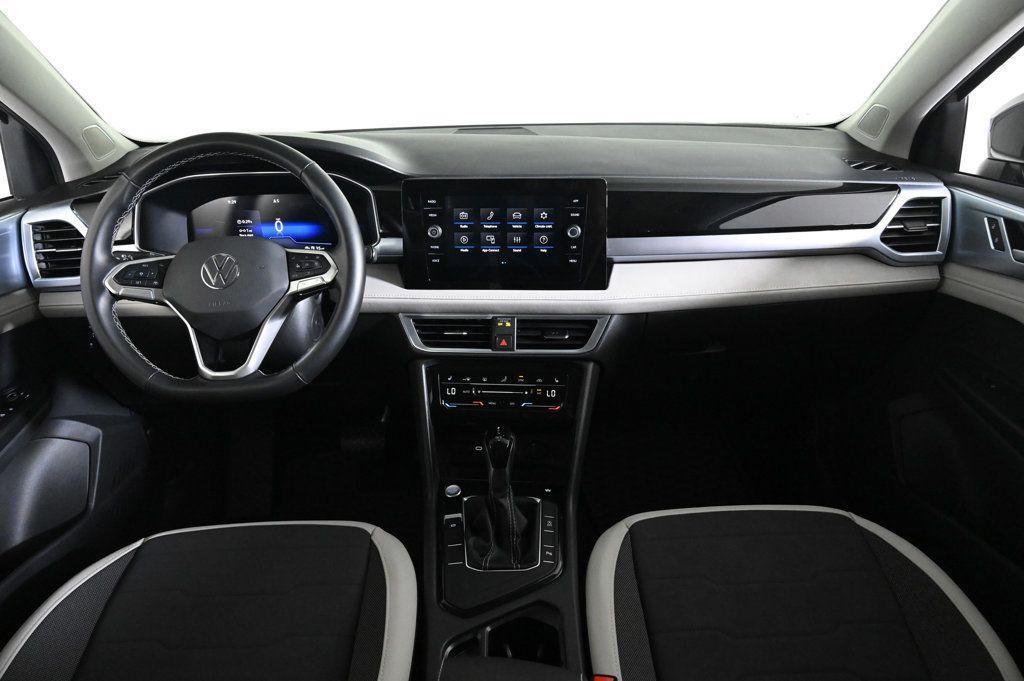 used 2025 Volkswagen Taos car, priced at $24,400