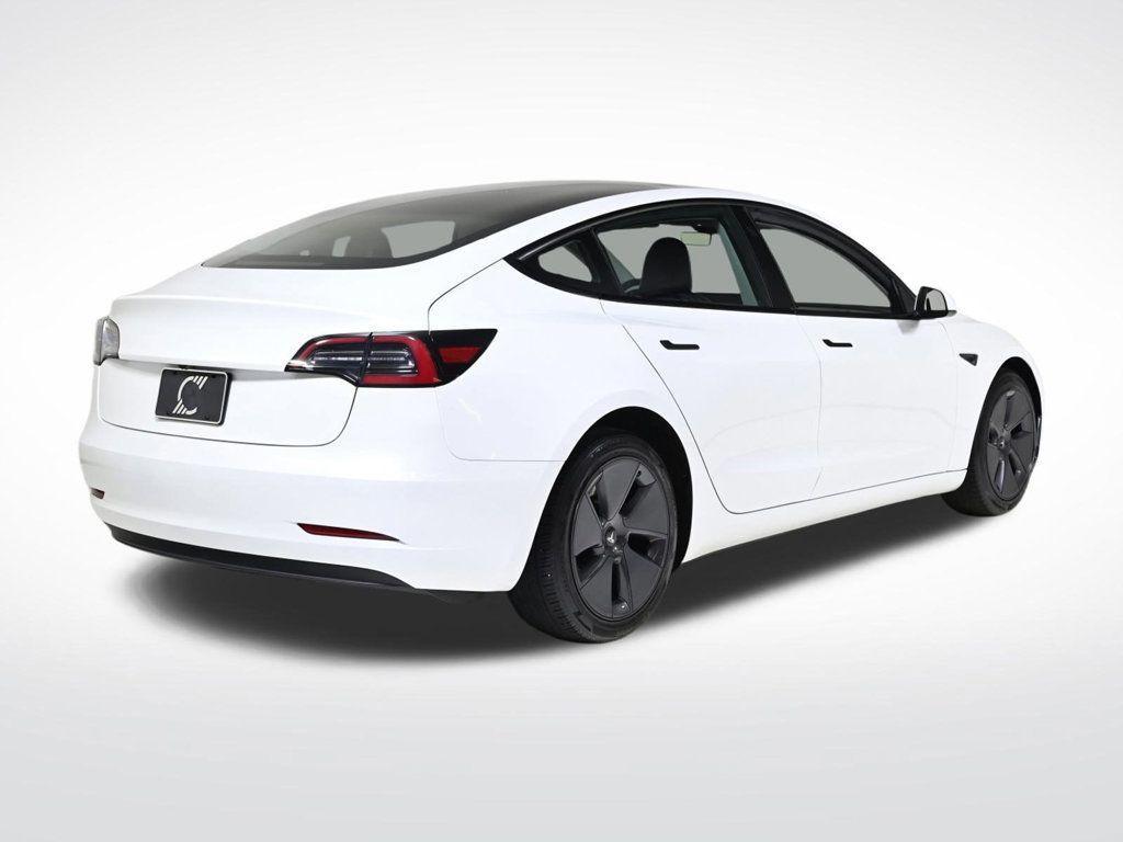 used 2023 Tesla Model 3 car, priced at $21,900
