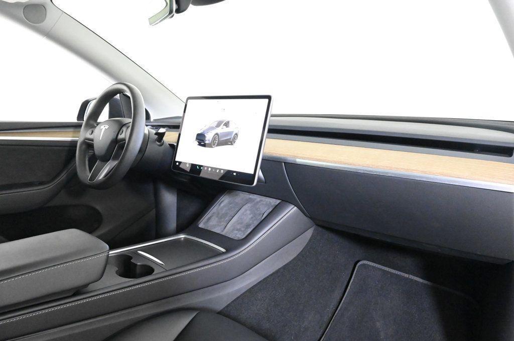 used 2024 Tesla Model Y car, priced at $32,900