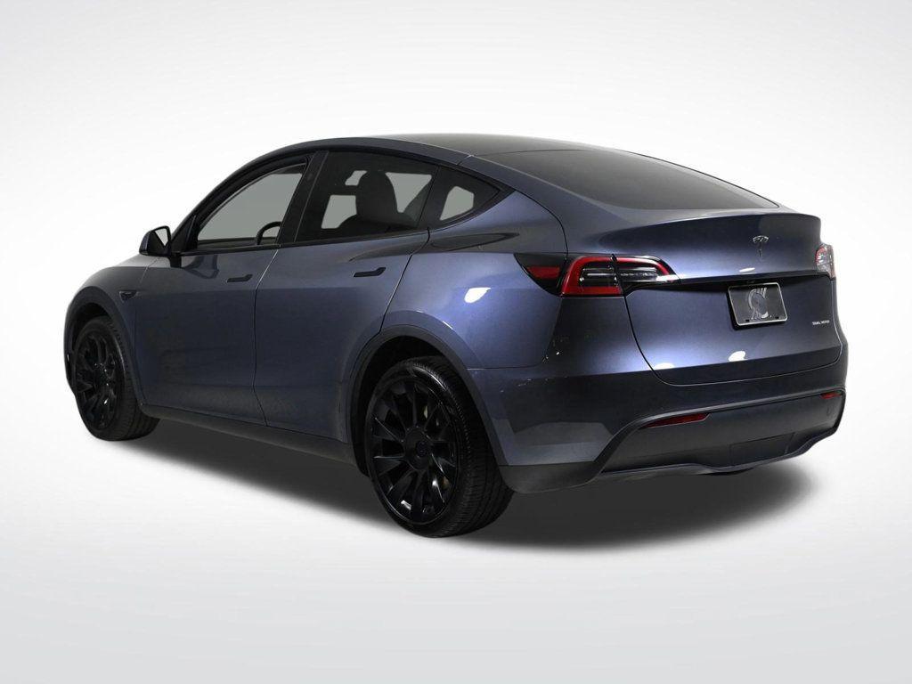 used 2024 Tesla Model Y car, priced at $32,900