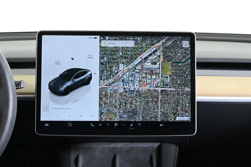 used 2024 Tesla Model Y car, priced at $32,900