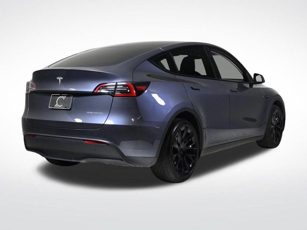 used 2024 Tesla Model Y car, priced at $32,900