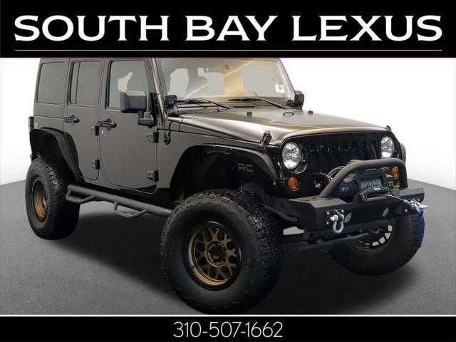 used 2011 Jeep Wrangler Unlimited car, priced at $19,900