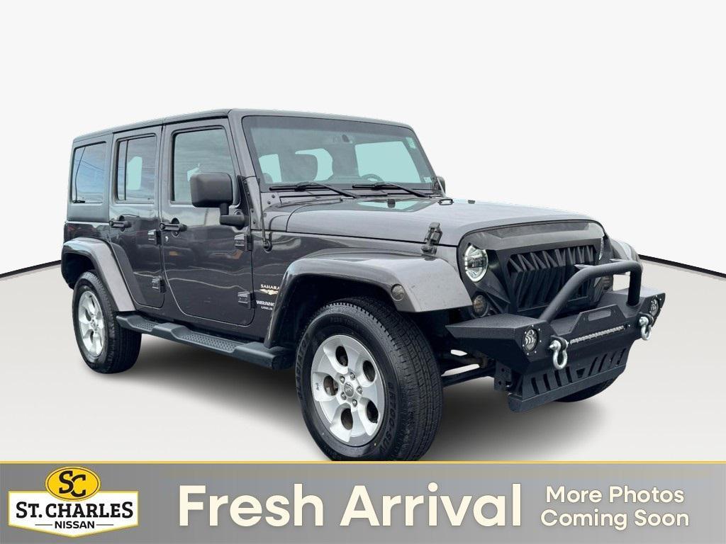 used 2014 Jeep Wrangler Unlimited car, priced at $15,555