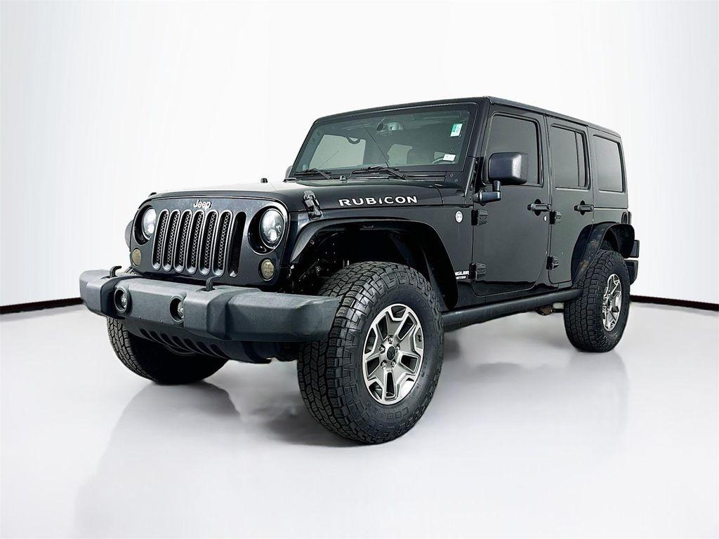 used 2013 Jeep Wrangler Unlimited car, priced at $14,777