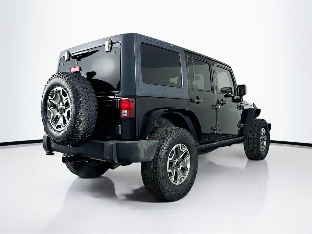 used 2013 Jeep Wrangler Unlimited car, priced at $14,777