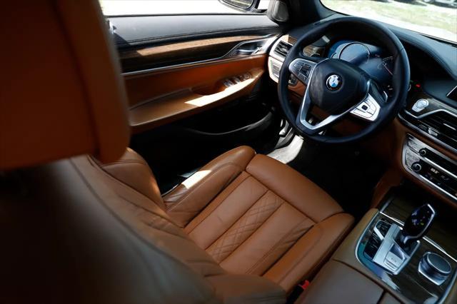used 2016 BMW 750 car, priced at $19,900