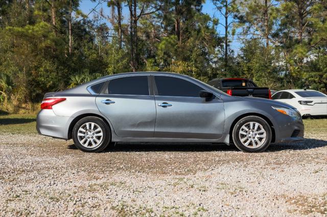 used 2016 Nissan Altima car, priced at $4,900