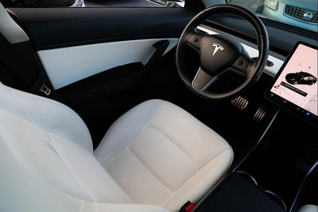 used 2019 Tesla Model 3 car, priced at $14,900
