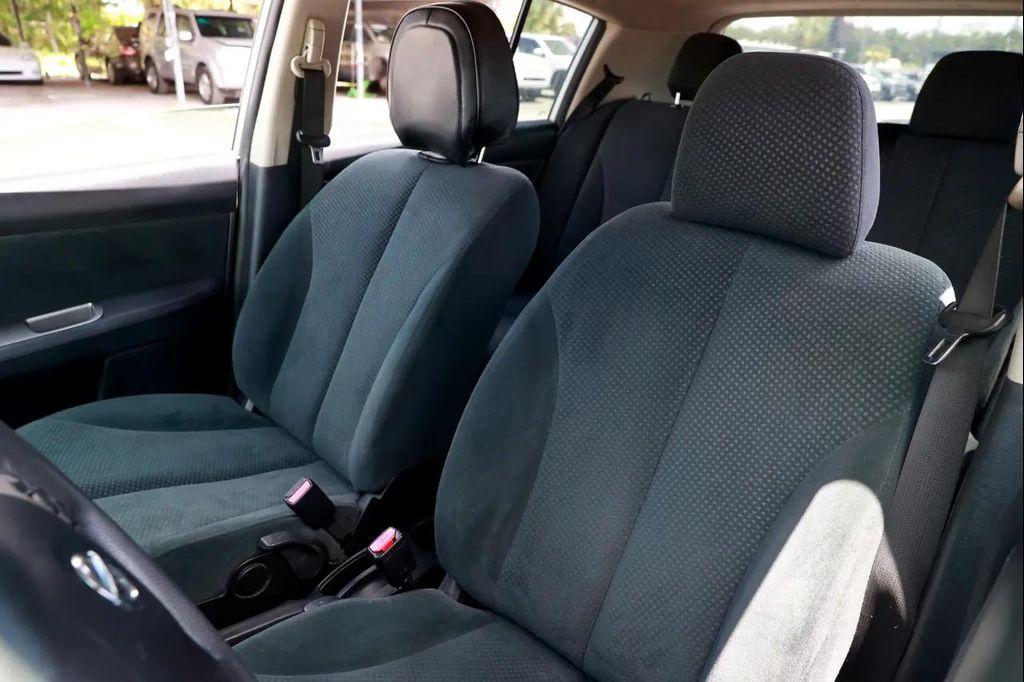 used 2012 Nissan Versa car, priced at $3,800