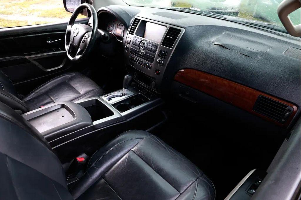 used 2015 Nissan Armada car, priced at $3,800