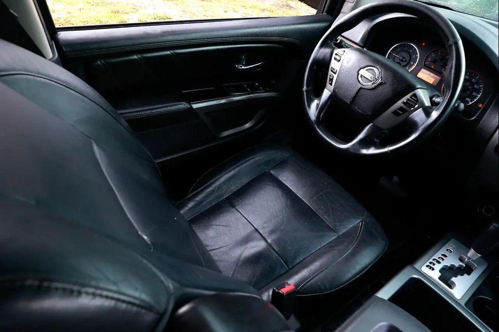 used 2015 Nissan Armada car, priced at $3,800