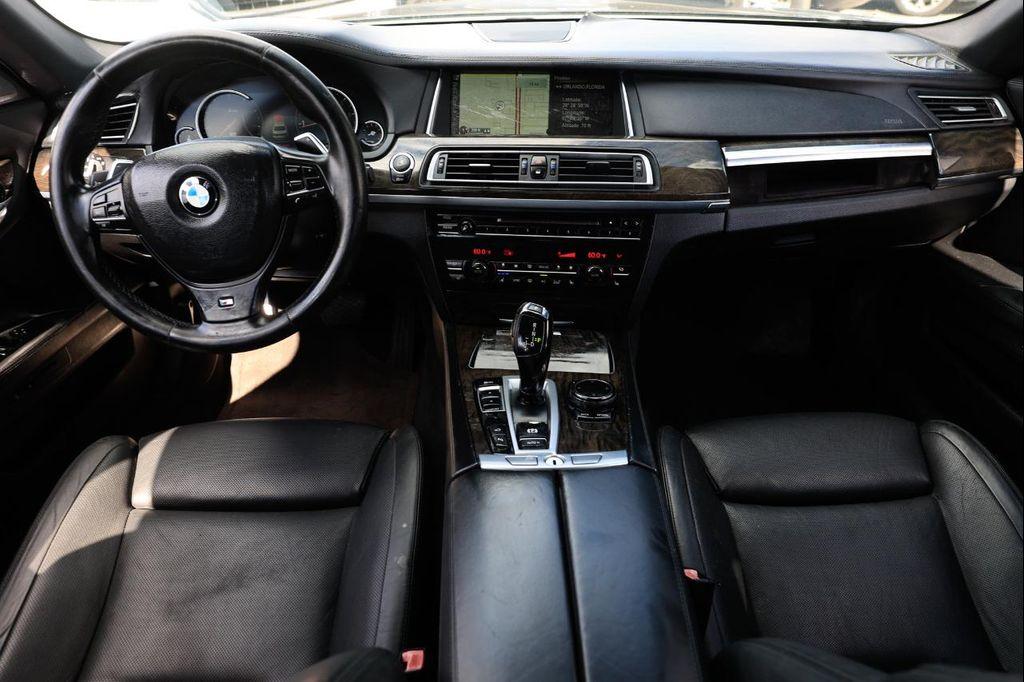 used 2014 BMW 750 car, priced at $7,900