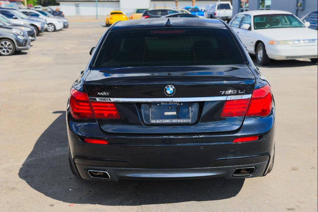 used 2014 BMW 750 car, priced at $7,900