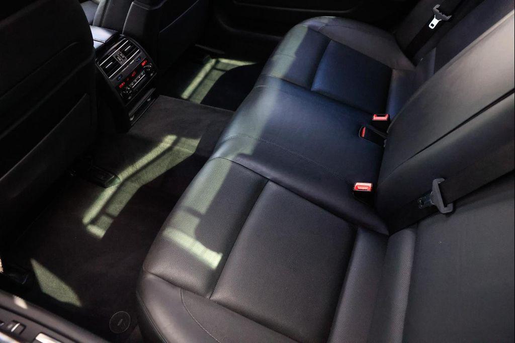 used 2014 BMW 750 car, priced at $7,900
