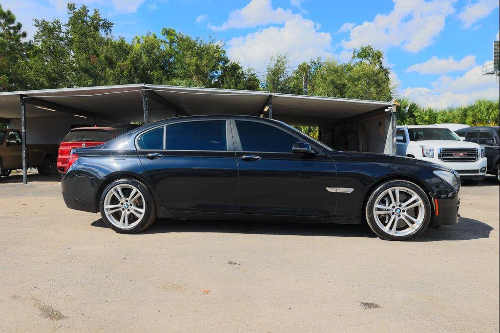 used 2014 BMW 750 car, priced at $7,900