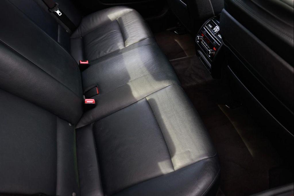 used 2013 BMW 740 car, priced at $10,500