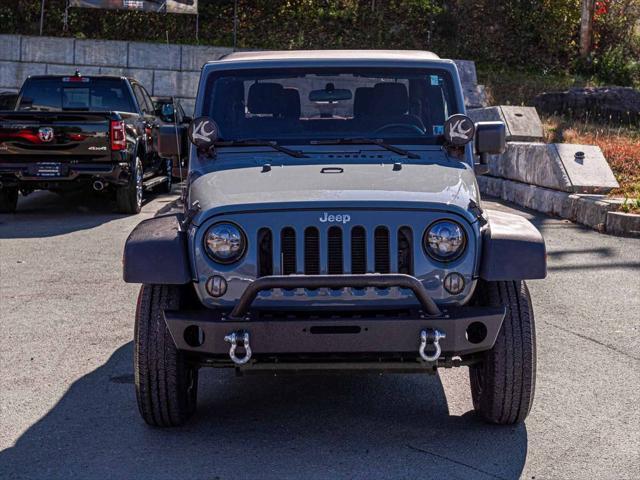 used 2014 Jeep Wrangler car, priced at $12,490