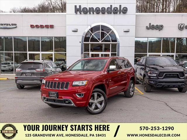 used 2014 Jeep Grand Cherokee car, priced at $10,490