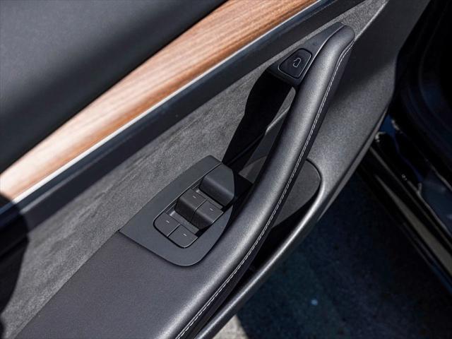 used 2023 Tesla Model 3 car, priced at $32,990