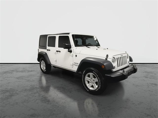 used 2015 Jeep Wrangler Unlimited car, priced at $15,634