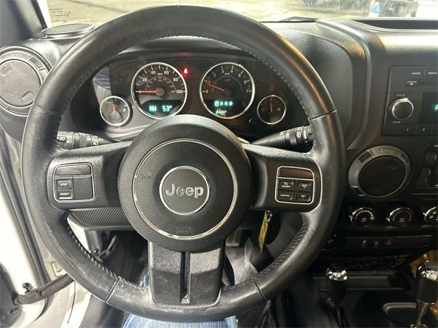 used 2015 Jeep Wrangler Unlimited car, priced at $15,634