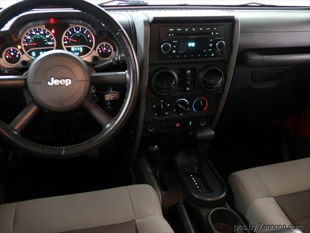 used 2010 Jeep Wrangler Unlimited car, priced at $11,990