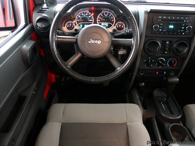 used 2010 Jeep Wrangler Unlimited car, priced at $11,990