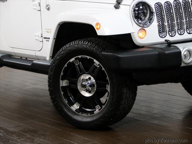 used 2014 Jeep Wrangler Unlimited car, priced at $19,900