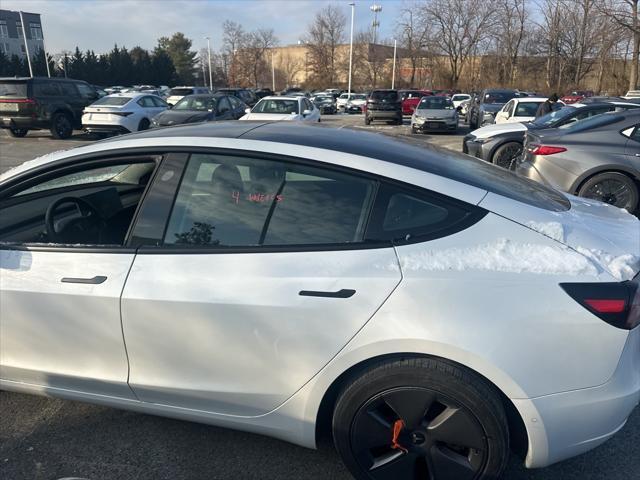 used 2022 Tesla Model 3 car, priced at $28,000