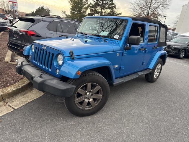 used 2015 Jeep Wrangler Unlimited car, priced at $17,375