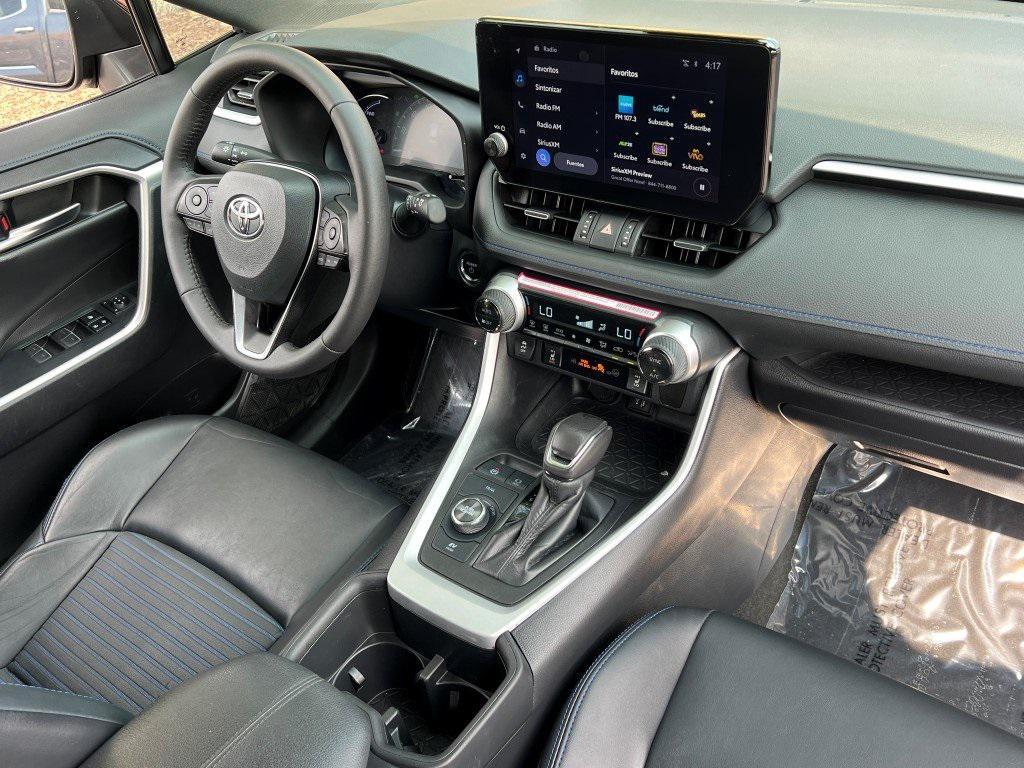 used 2024 Toyota RAV4 Hybrid car, priced at $33,299