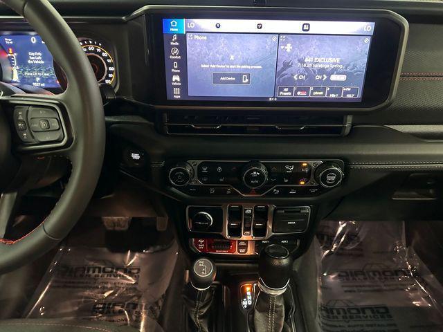 used 2024 Jeep Wrangler car, priced at $47,711