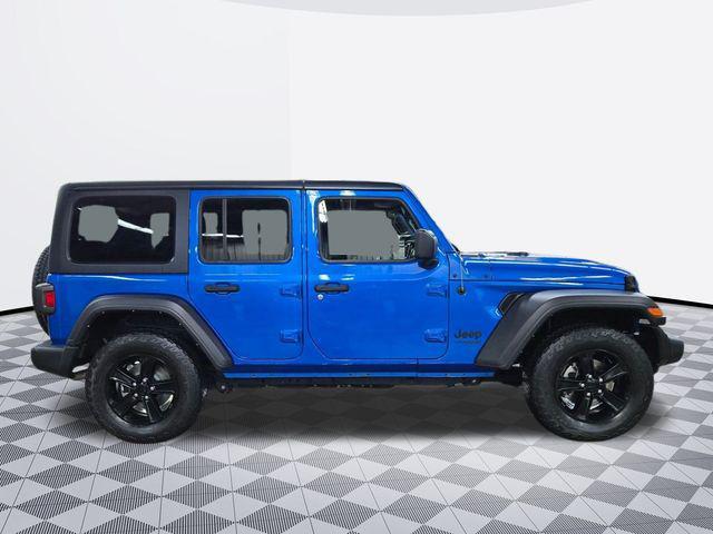 used 2021 Jeep Wrangler Unlimited car, priced at $31,749