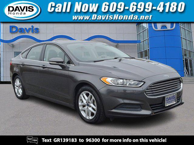 used 2016 Ford Fusion car, priced at $10,471