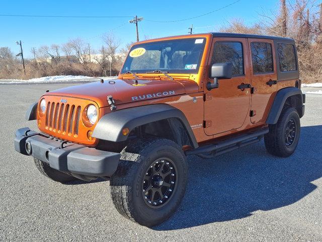 used 2011 Jeep Wrangler Unlimited car, priced at $17,991