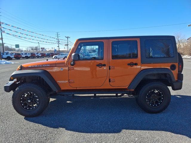 used 2011 Jeep Wrangler Unlimited car, priced at $17,991