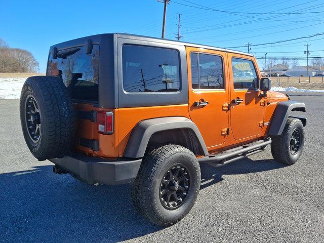 used 2011 Jeep Wrangler Unlimited car, priced at $17,991